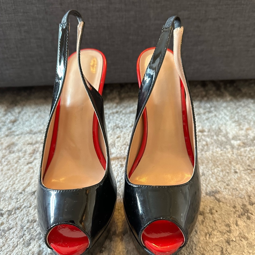 Red/Black peep toe high heel shoes. Size 7.